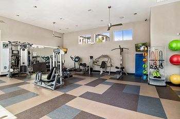 First and Main Apartments fitness center weight machines and exercise balls